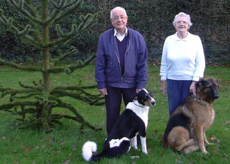 barry and carole with two dogs outside